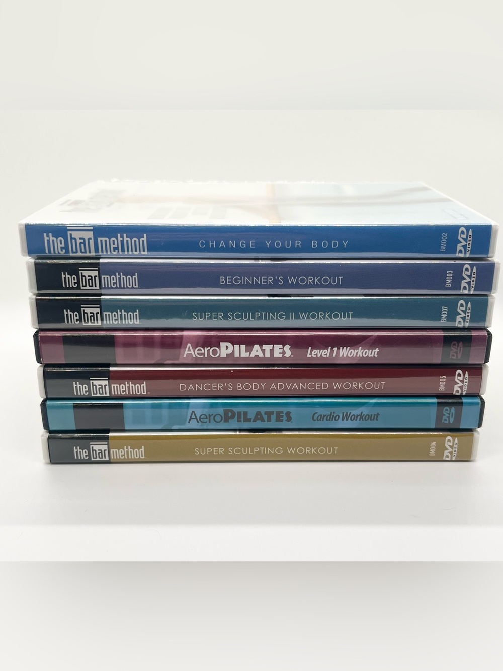 Workout DVDs; The Bar Method 4 DVD Bundle Set plus 2 Aero Pilates DVDs